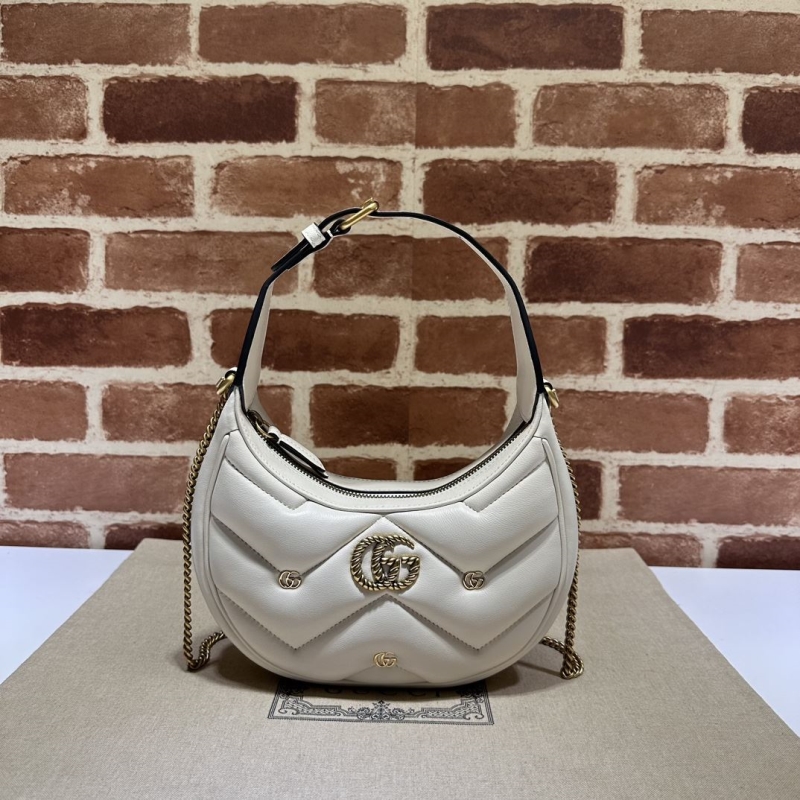 G*u*i top handle bags